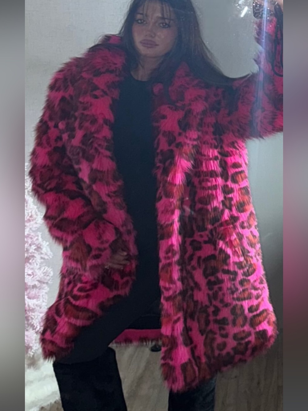 Woman’s over sized fur leopard coat and matching hat